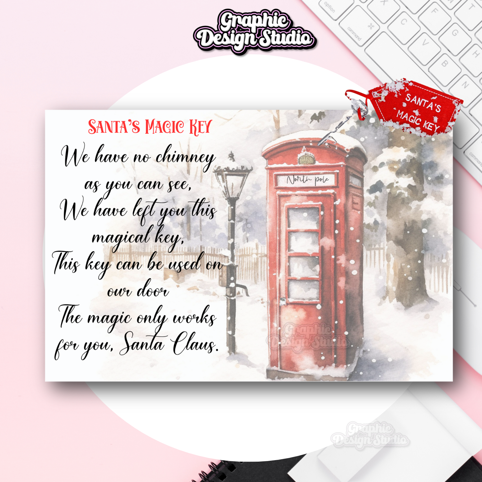 Christmas card with red telephone box and snowy scene, featuring Santa's Magic Key message.