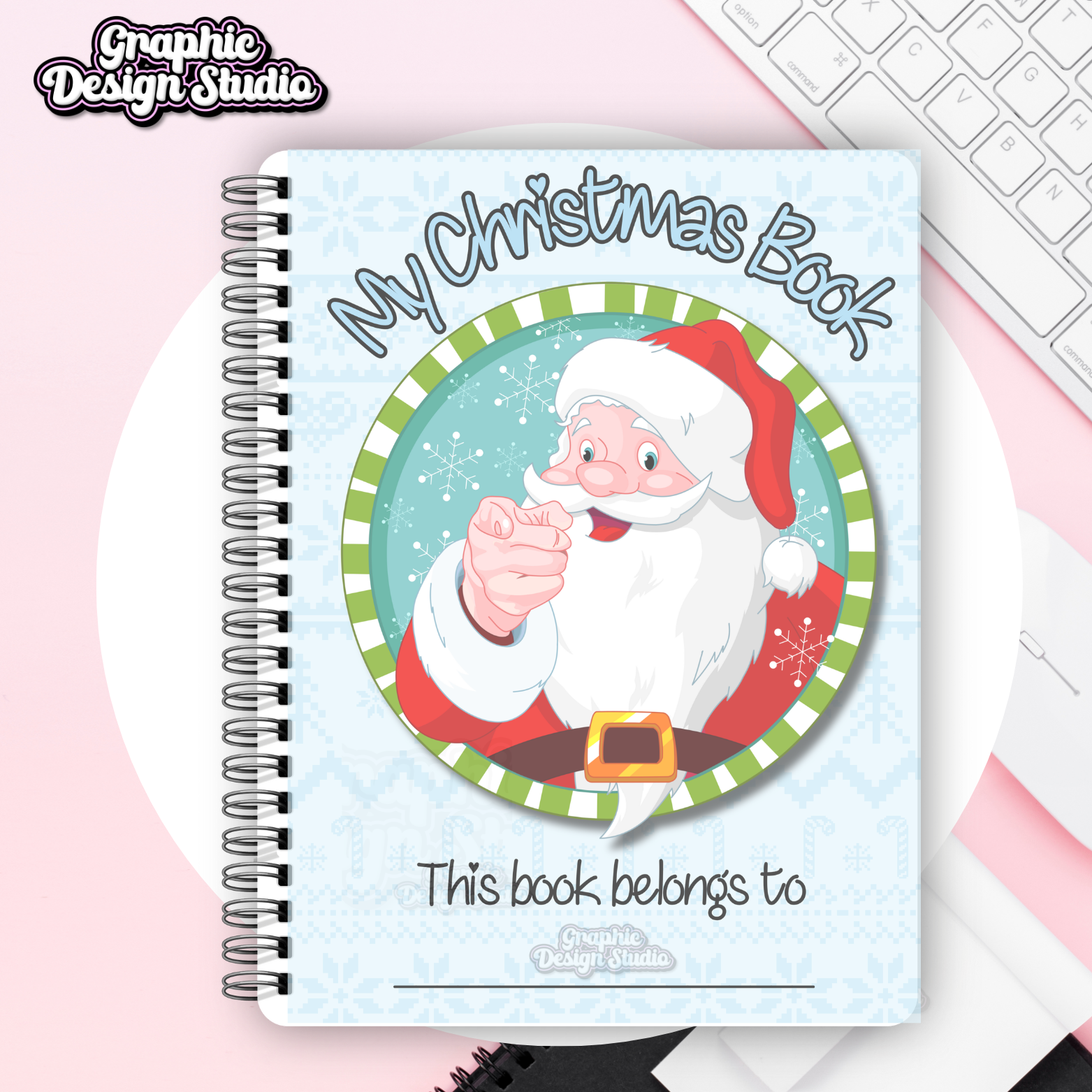 Spiral-bound book titled 'My Christmas Book' with a cartoon Santa Claus on a light blue background.
