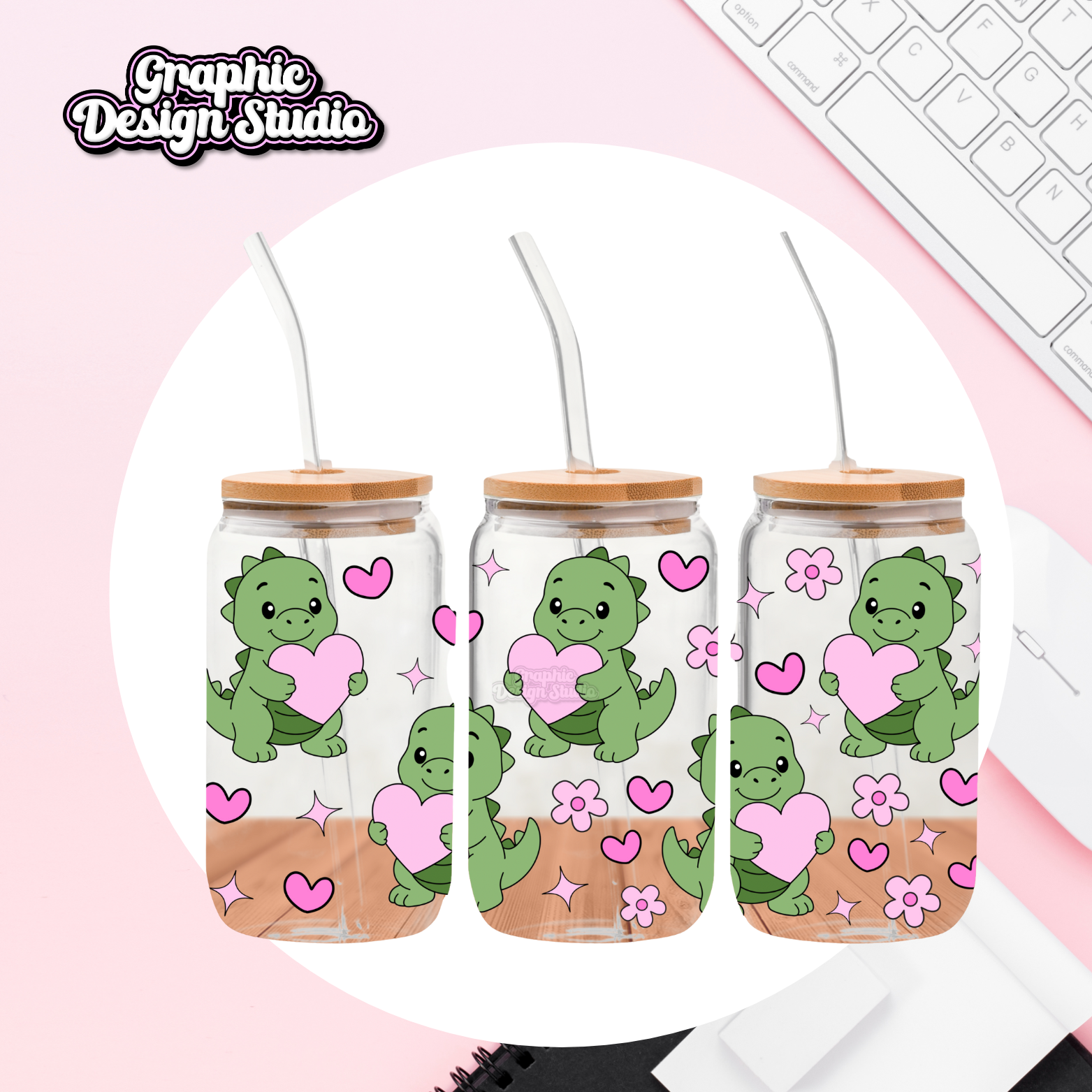 Three glass tumblers with dinosaur designs on a pink background