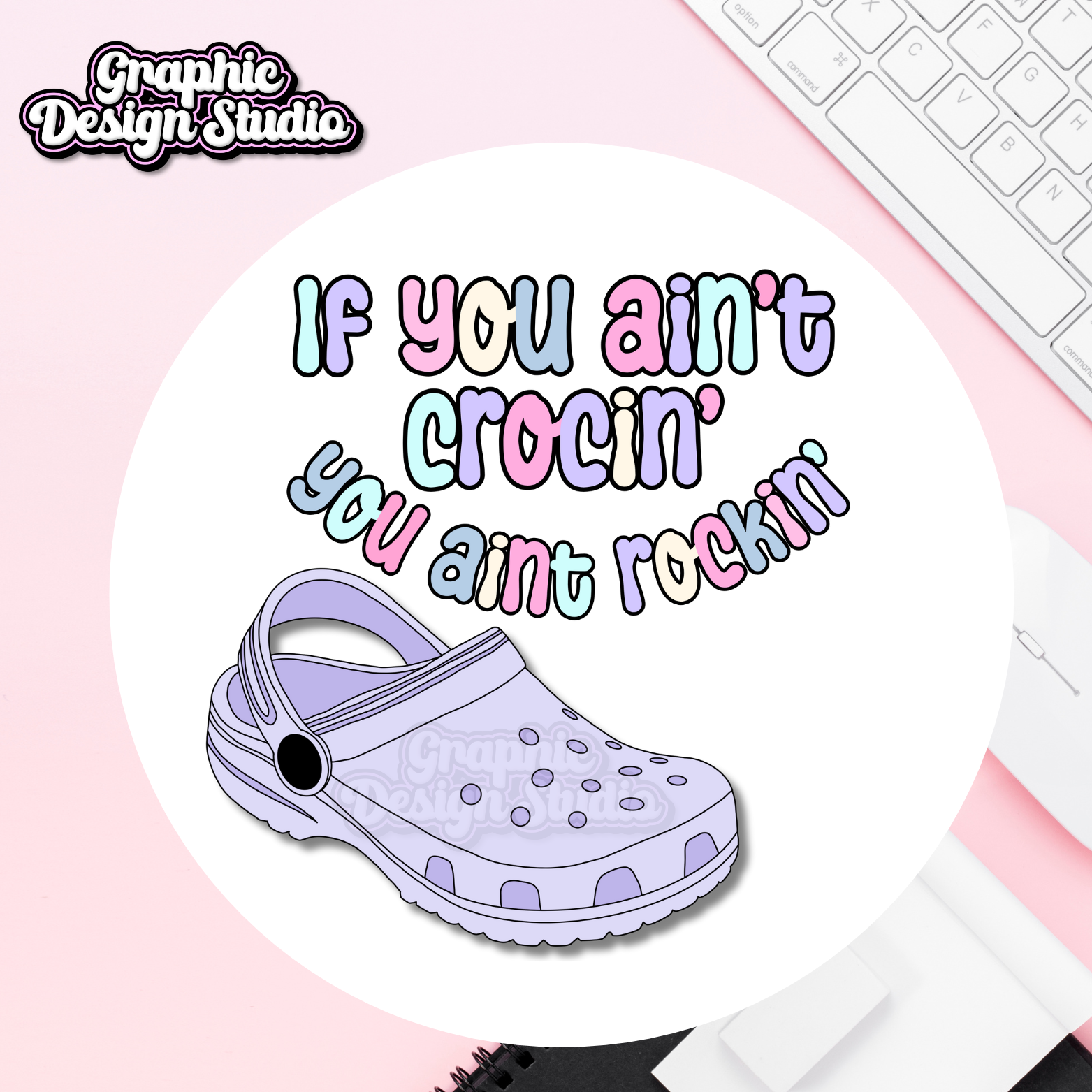 An image of a design for sublimation with purple crocs and multicoloured font text