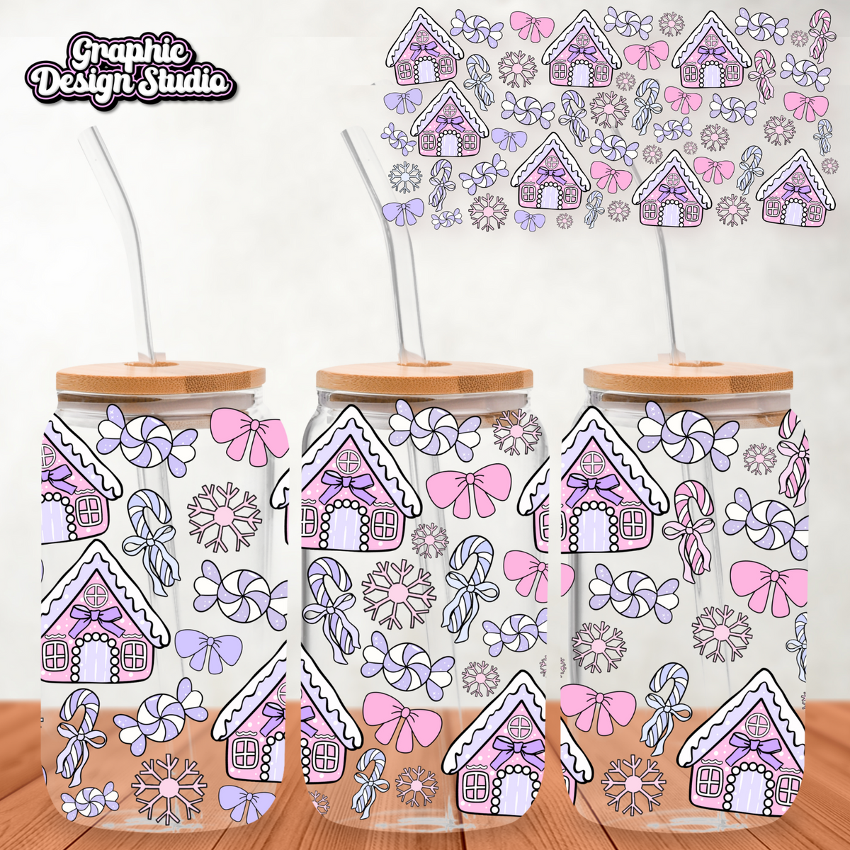 Three glass tumblers with gingerbread house pattern on a white background