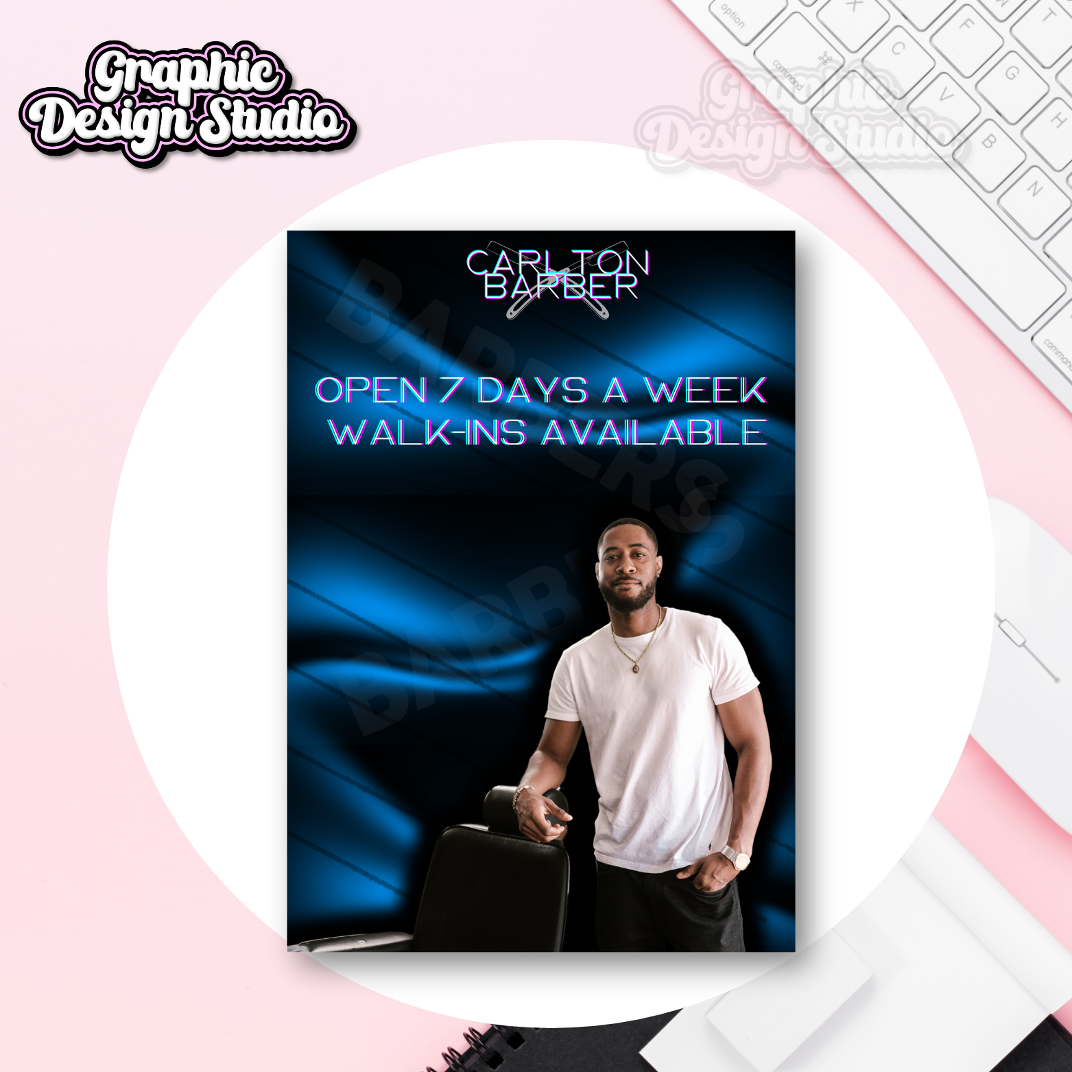 Advertisement for Carlton Barber with a man holding a suitcase on a blue and black background, placed on a pink surface with a keyboard.